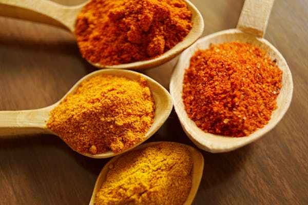 a picture of turmeric powder featured in the top 5 herbal remedies article